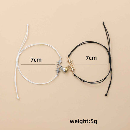 Magnetic electrocardiogram couple bracelet