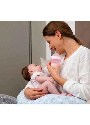 Chicco NaturalFeeling Baby Bottle 150ml (0m+) with normal flow, made of soft silicone, featuring an anti-colic double valve for reduced air intake, ideal for alternating between breast and bottle feeding.