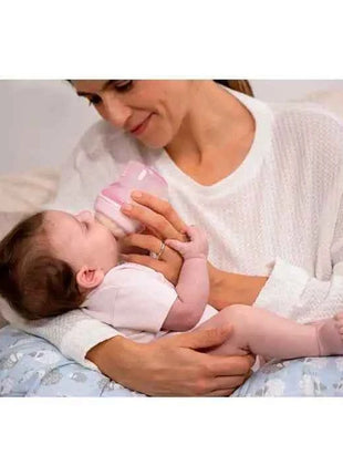 Chicco NaturalFeeling Baby Bottle 150ml (0m+) with normal flow, made of soft silicone, featuring an anti-colic double valve for reduced air intake, ideal for alternating between breast and bottle feeding.