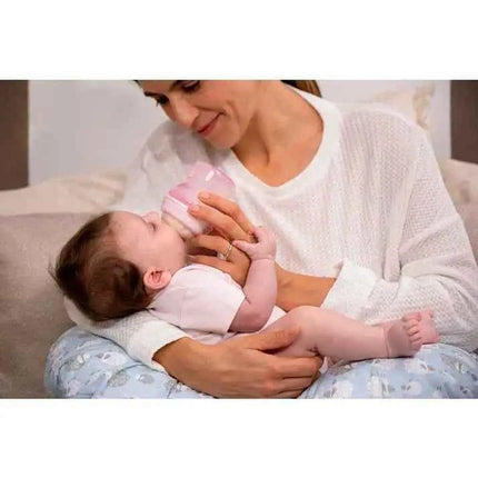 Chicco NaturalFeeling Baby Bottle 150ml (0m+) with normal flow, made of soft silicone, featuring an anti-colic double valve for reduced air intake, ideal for alternating between breast and bottle feeding.