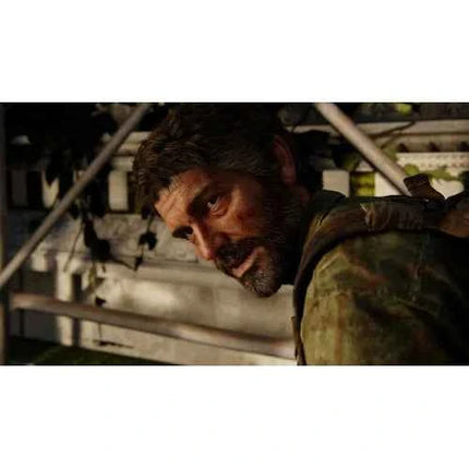 The Last Of Us Part I PS5 - PlayStation 5 game with enhanced graphics, 3D audio, haptic feedback, and fast loading times; includes the original story and Left Behind expansion for immersive gameplay experience.