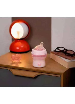Chicco NaturalFeeling Baby Bottle 150ml (0m+) with normal flow, made of soft silicone, featuring an anti-colic double valve for reduced air intake, ideal for alternating between breast and bottle feeding.