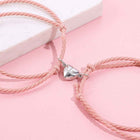 Magnetic electrocardiogram couple bracelet