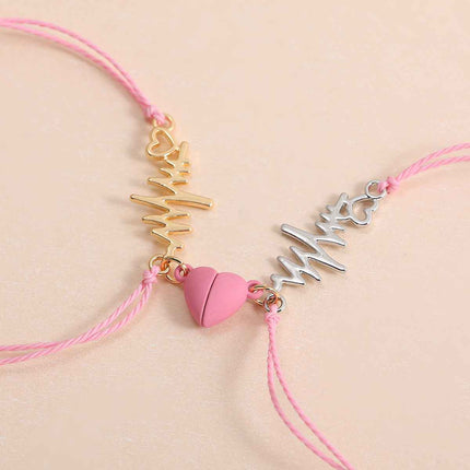 Magnetic electrocardiogram couple bracelet