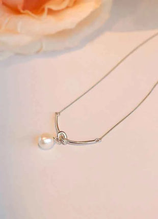 Huitan Elegante Collana con Ciondolo a Nodo per Donna, Perla Sintetica, Accessori Versatili per Matrimoni e Fidanzamenti, Gioielli di Lusso alla Moda per Signore