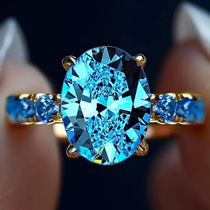 Anello di Lusso Huitan per Donna, Versatile Accessorio Dorato per Feste, Stile Semplice con Incastonatura di Zirconi Blu Brillanti, Gioiello Elegante per Matrimoni