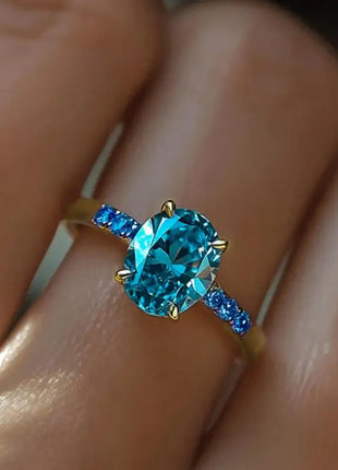 Huitan Luxury Ring for Women, Versatile Gold Accessory for Parties, Simple Style with Sparkling Blue Zircon Setting, Elegant Jewelry for Weddings
