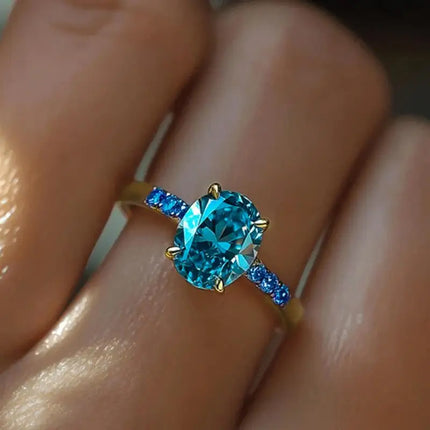 Anello di Lusso Huitan per Donna, Versatile Accessorio Dorato per Feste, Stile Semplice con Incastonatura di Zirconi Blu Brillanti, Gioiello Elegante per Matrimoni
