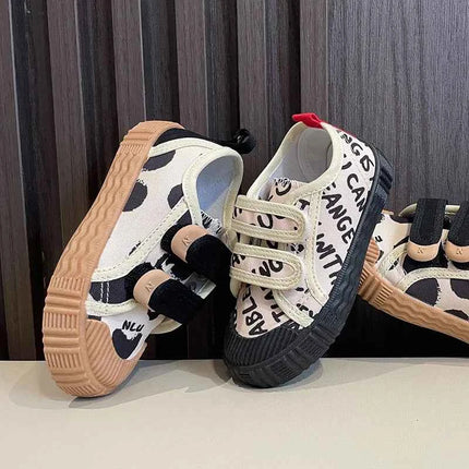 Scarpe per bambini per ragazze ragazzi scarpe di tela con suola morbida antiscivolo lettere per bambini scarpe Casual per bambini Tenis scarpe da ginnastica traspiranti versatili