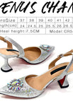 A PAIR OF SILVER SHOES