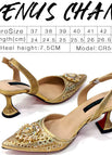 A PAIR OF GOLD SHOES