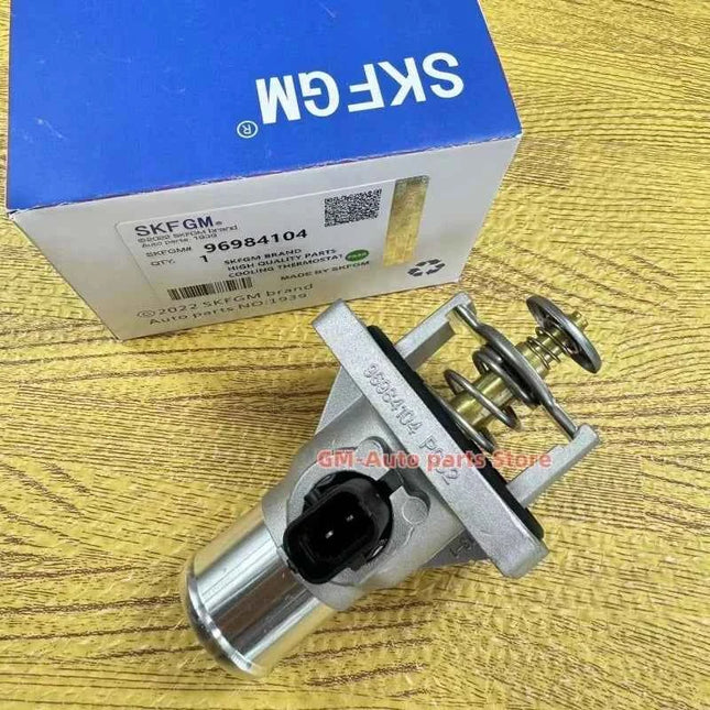 OEM originale del gruppo termostato del liquido di raffreddamento del motore # 96984104 25193683 55578419   Per Chevrolet Cruze Sonic Aveo Astra Zafira Signum
