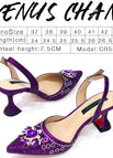 A PAIR OF PURPLE SHOES
