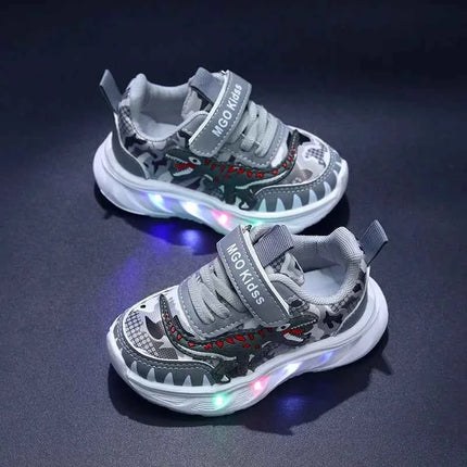 Scarpe sportive per bambini nuove primaverili Dinosauro del fumetto Scarpe leggere a LED per bambini Suola morbida Scarpe da ginnastica causali per ragazzi 2-6 anni