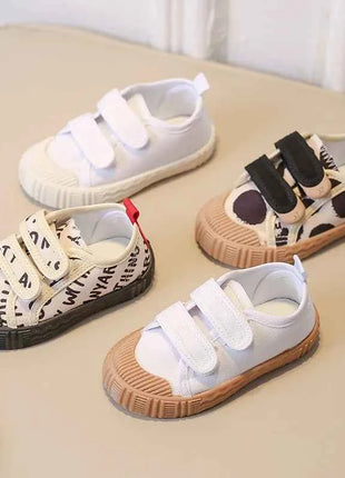 Scarpe per bambini per ragazze ragazzi scarpe di tela con suola morbida antiscivolo lettere per bambini scarpe Casual per bambini Tenis scarpe da ginnastica traspiranti versatili