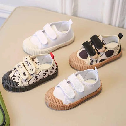 Scarpe per bambini per ragazze ragazzi scarpe di tela con suola morbida antiscivolo lettere per bambini scarpe Casual per bambini Tenis scarpe da ginnastica traspiranti versatili