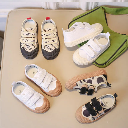 Scarpe per bambini per ragazze ragazzi scarpe di tela con suola morbida antiscivolo lettere per bambini scarpe Casual per bambini Tenis scarpe da ginnastica traspiranti versatili
