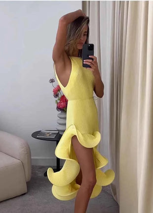 Abito lungo snellente in vita irregolare senza maniche stile vacanza elegante e sexy delle nuove donne di moda estiva 2025