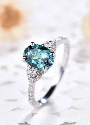 Huitan Anelli ovali blu CZ dal design semplice ed elegante da donna per la festa di anniversario, regalo per gioielli eleganti con temperamento da donna