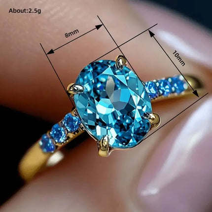Anello di Lusso Huitan per Donna, Versatile Accessorio Dorato per Feste, Stile Semplice con Incastonatura di Zirconi Blu Brillanti, Gioiello Elegante per Matrimoni